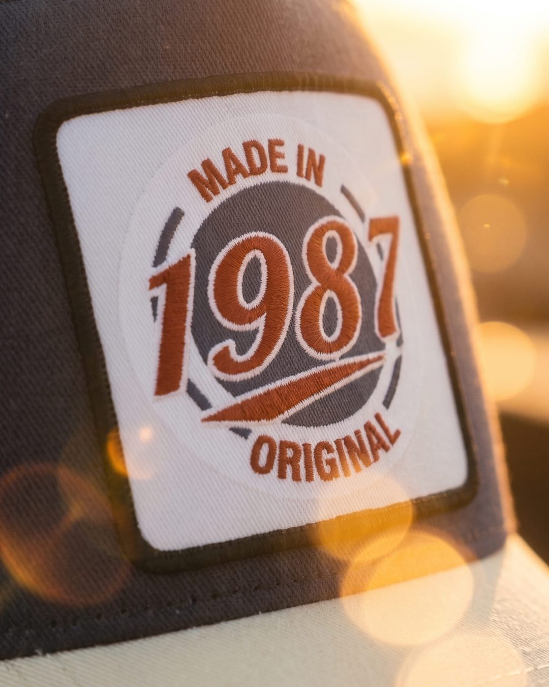 Embroidery_on_cap_sunset_2K_202607081729
